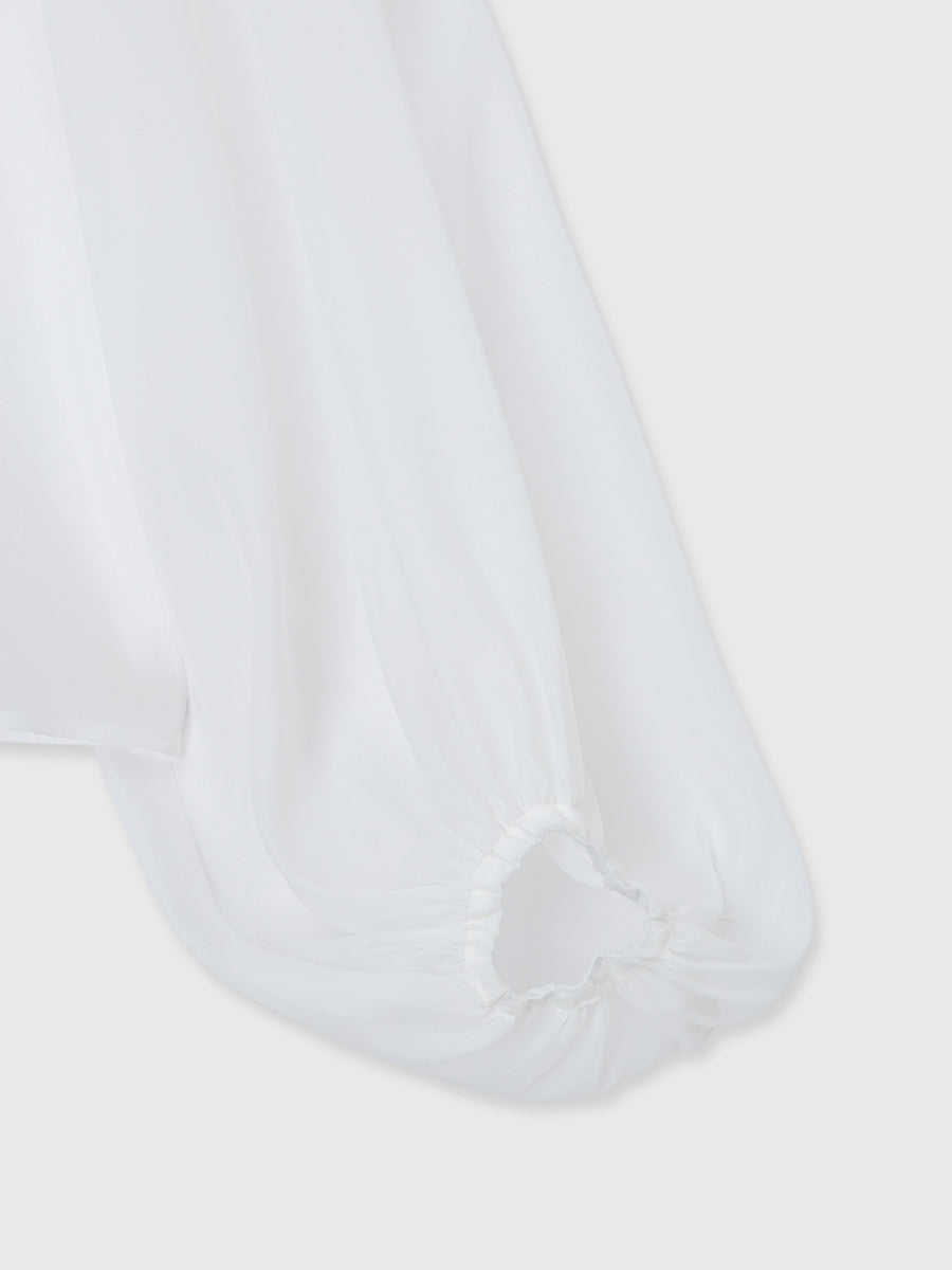 ボウタイラッフルブラウス