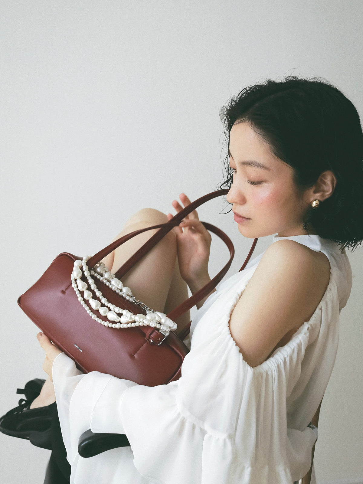 ラッフルトップス