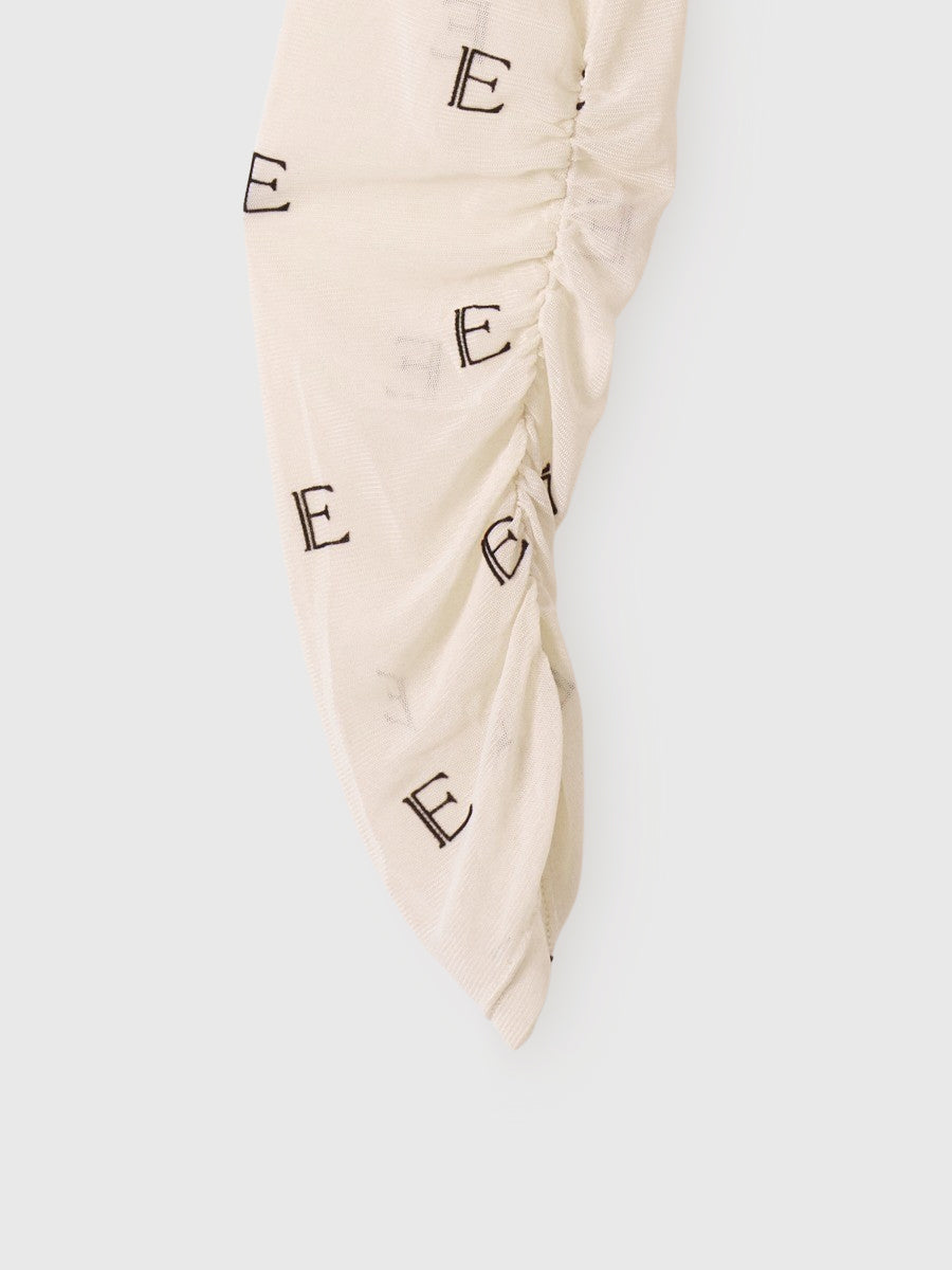 モノグラムカットアウトチュールトップス