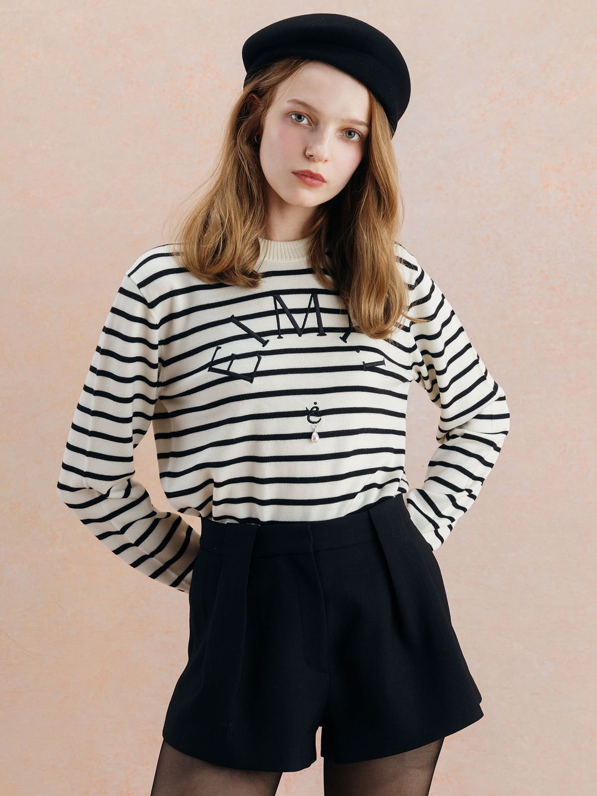 EIMY LOGO KNIT TOPS