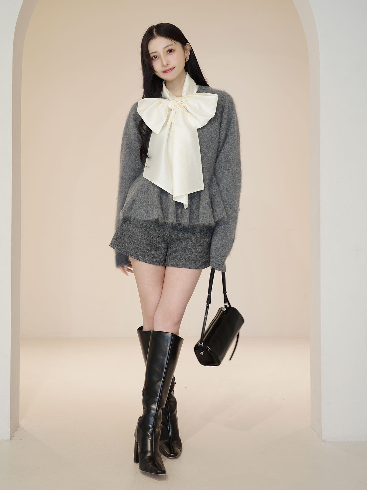 ウール起毛ペプラムニットカーディガン