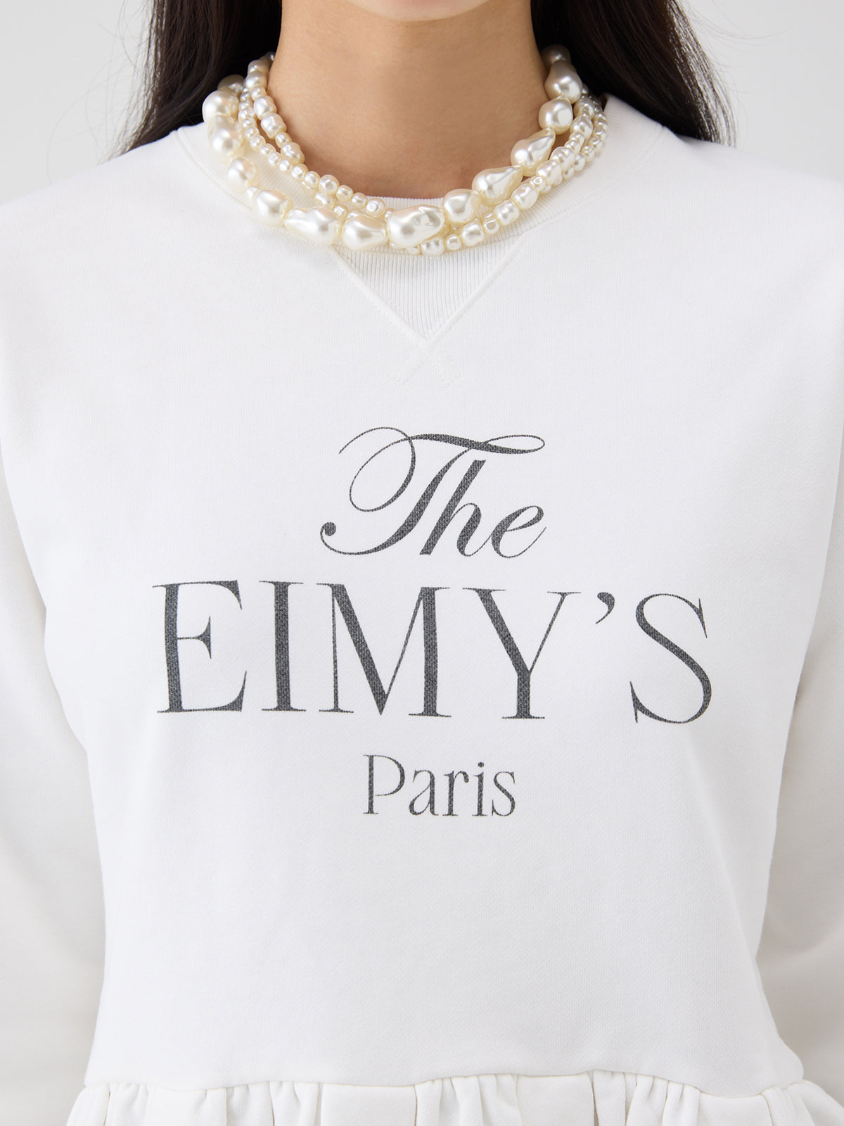 バリエプリントぺプラムスウェットトップス