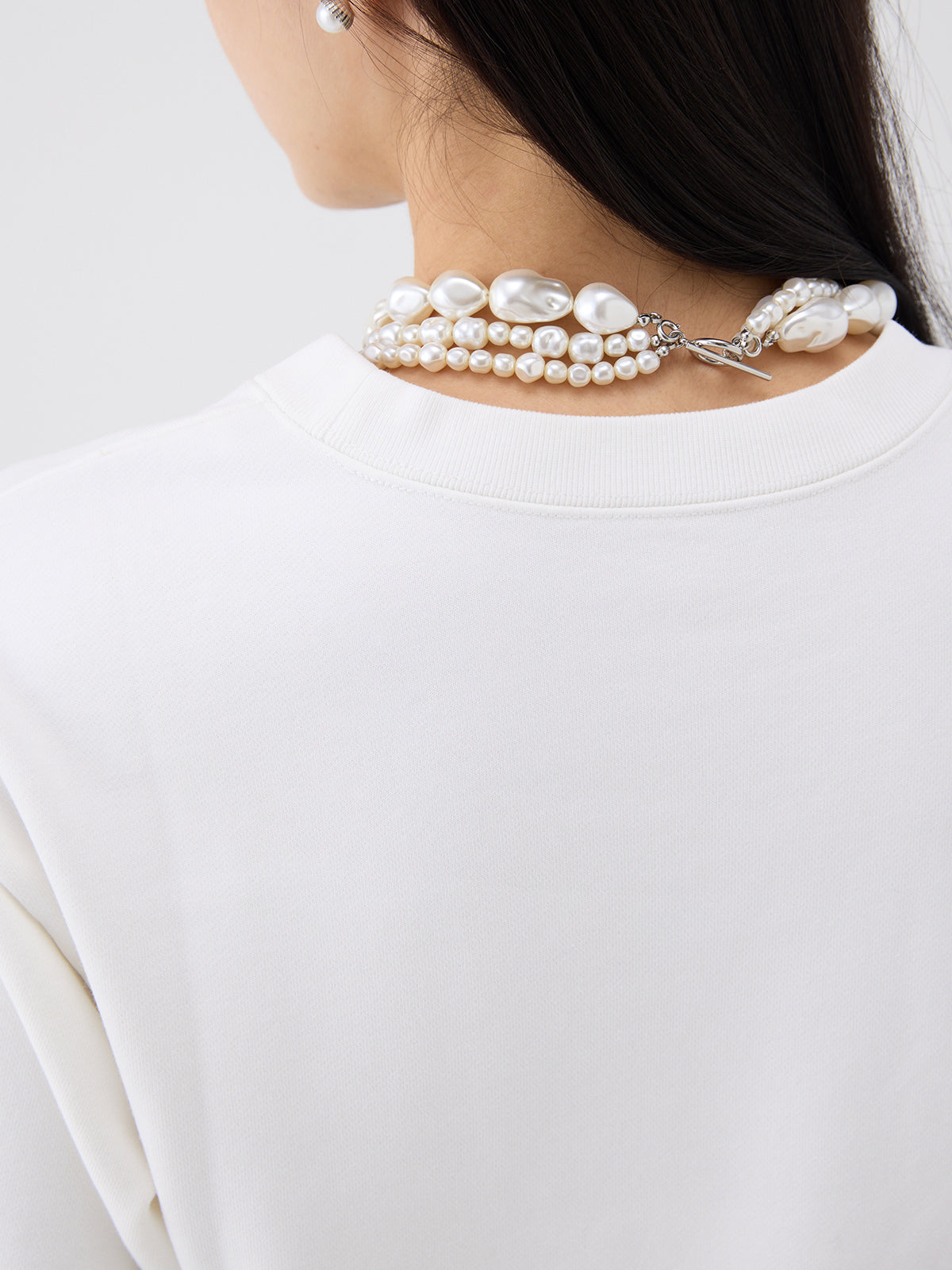 バリエプリントぺプラムスウェットトップス